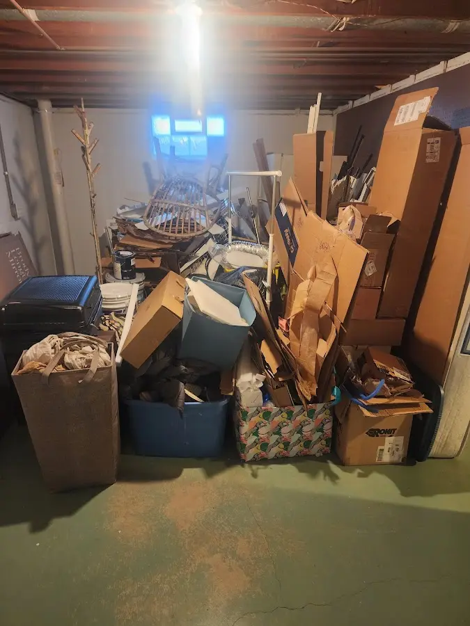 Roll-off dumpster container at job site for 20 Yard Dumpster Rental in Ste. Genevieve